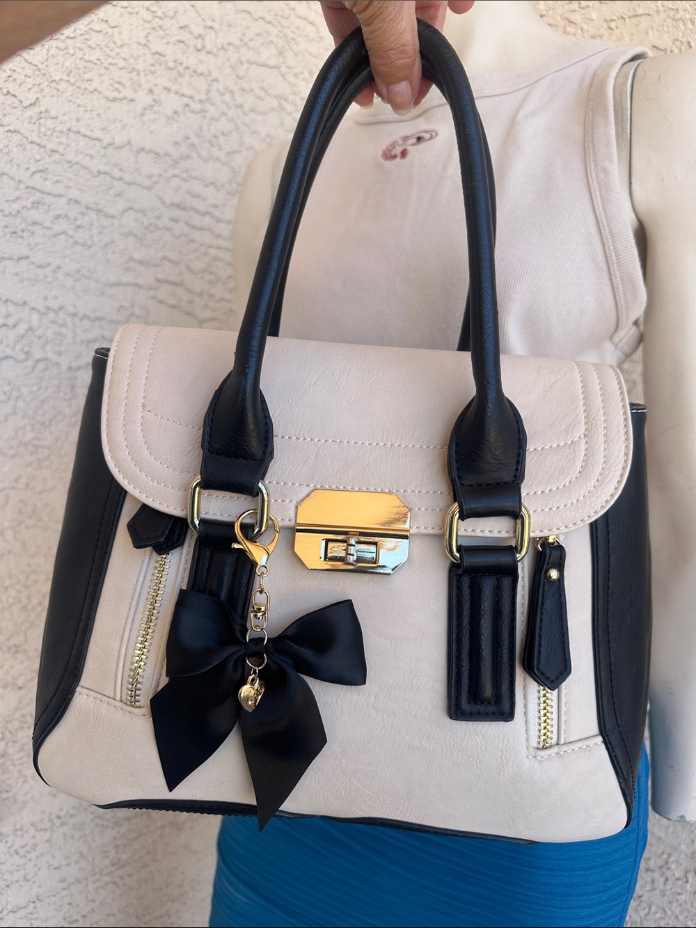 Charming Charlie Two-Tone Satchel in Cream and Black with Bow Charm